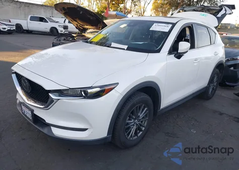 2021 Mazda Cx-5 Touring z USA, uszkodzony, nr VIN JM3KFACM5M1384831